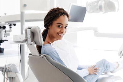 woman smiling after getting ridge augmentation at Napa Valley Dental Group