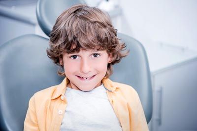 child smiling after his dental appointment at Napa Valley Dental Group