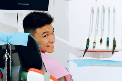 man smiling after having his wisdom teeth removed at Napa Valley Dental Group